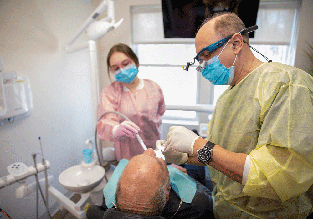 Dr. Radwan and assistant performing a treatment